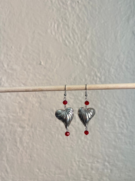 red metal heart earrings